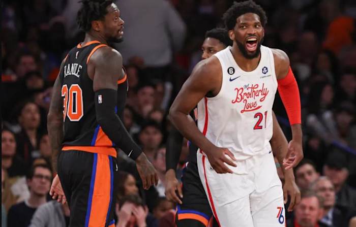 A potential New York Knicks deal for Joel Embiid (R, 21) is said to include Julius Randle (L, 30)
